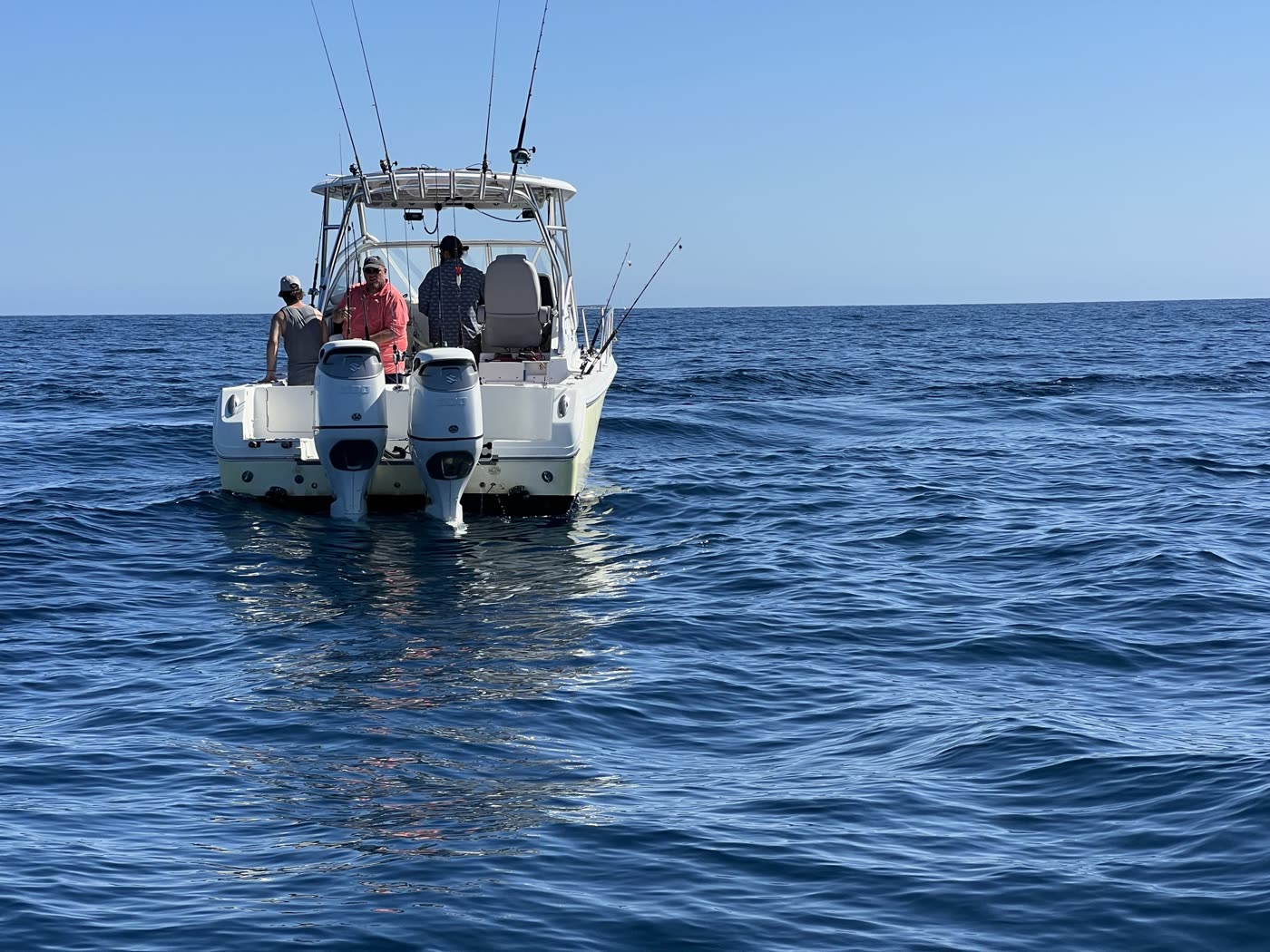 Dead-astern view showing both Suzuki 300 outboards